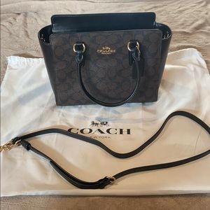 COACH black and brown mid size purse w gold detail